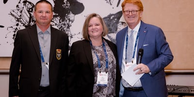Versailles IGA's Daren Wood and Kelly Gutzwiller with IGA CEO John Ross