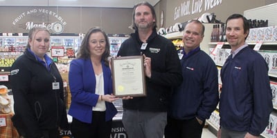 Hansen's IGA team receiving award