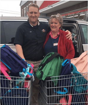 Star City IGA employees Joe Theriault & Connie Sturgeon