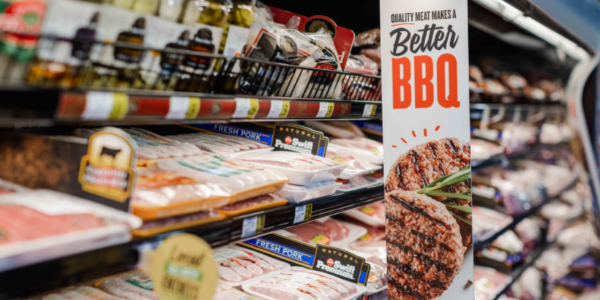 Quality Meat Makes a Better BBQ Sign in an IGA Store