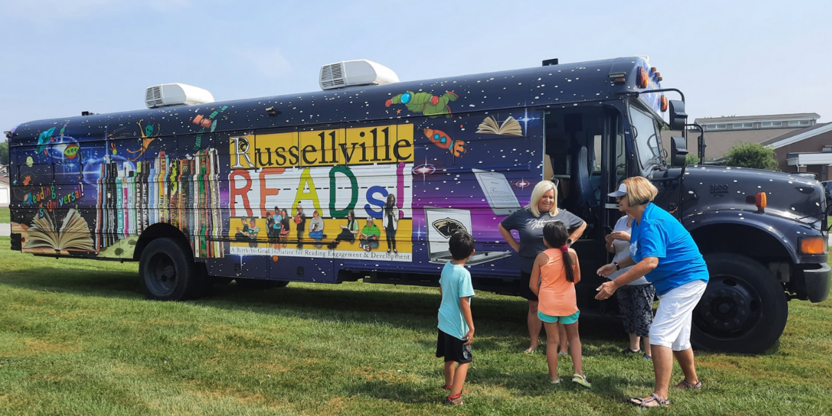 Russellville Reads bus at Price Less IGA's event