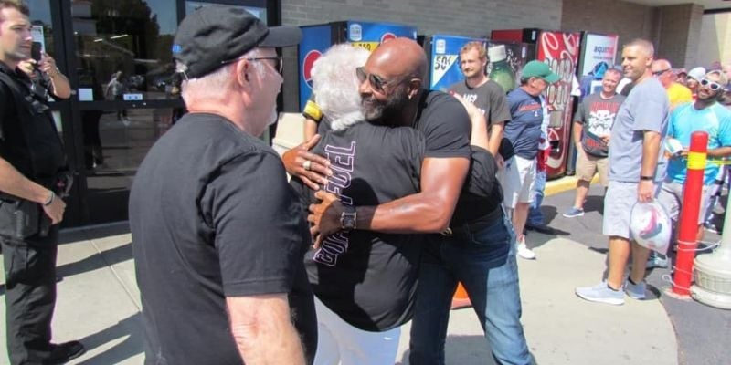 Jerry Rice hugs Terrie Baker