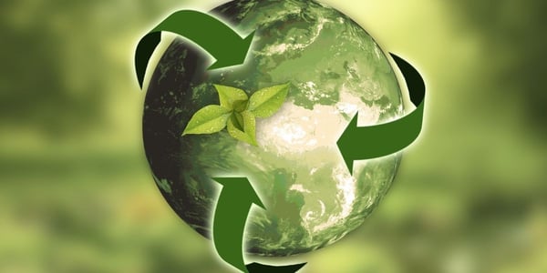 image of Earth with recycling arrows around it