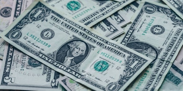 dollar and five dollar bills