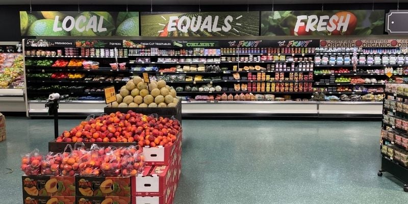 IGA Local Equals Fresh signage in a produce dept