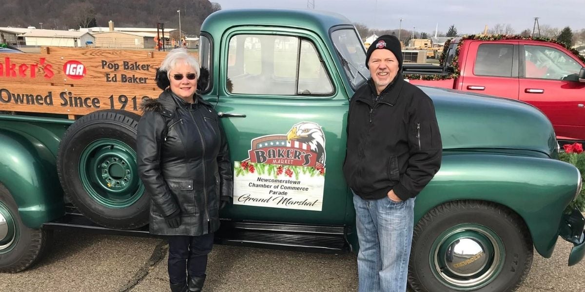 Terrie and Gary Baker in front of Baker's IGA truck