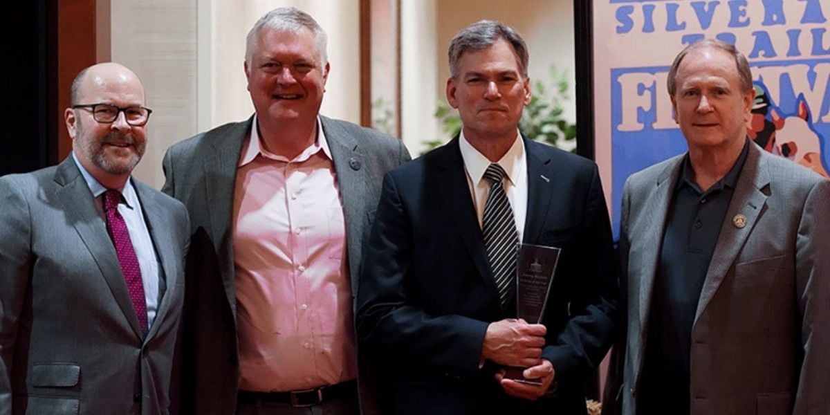  From left to right: Rob Ikard, TGCSA president; Frank Schmitt, AWG Memphis division VP and division manager; Jimmy Nichols, president and COO of Houchens Food Group; and Terry Roberts, AWG Nashville division VP and division manager.