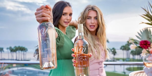 Nina Dobrev and Julianne Hough hold Fresh Vine rosé