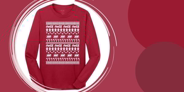IGA and Coca-Cola logos on a holiday sweatshirt