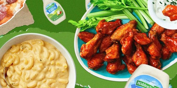 Hidden Valley Ranch bottle next to chicken wings and mac and cheese