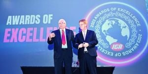 Mark Batenic and John Ross on stage at the IGA Awards of Excellence Ceremony