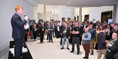 IGA CEO John Ross speaks to a crowd during The NGA Show 2023