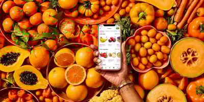 Instacart app on mobile with orange produce 1200