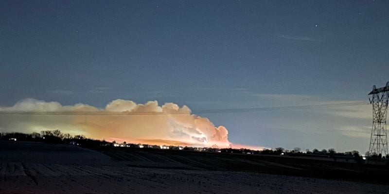 Smoke from the fire can be seen a half mile away