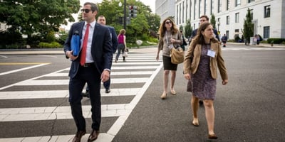 NGA members cross the street at the Fly-In event