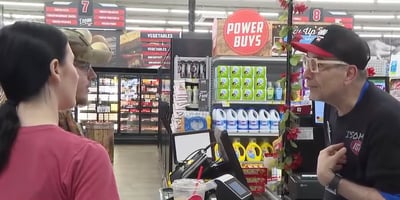 Father Jim Sichko at Isom IGA