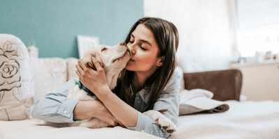 Woman and her yellow lab