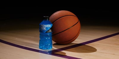 Powerade and basketball on bball court