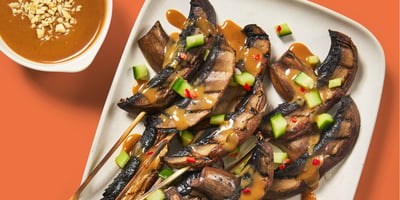 Grilled mushroom skewers on a plate