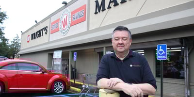 Jimmy Wright stands in front of Wright's Market