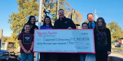 Young's Payless donation check