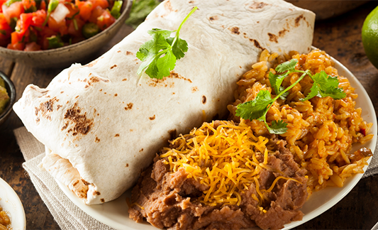 oven baked burrito on a dinner plate 