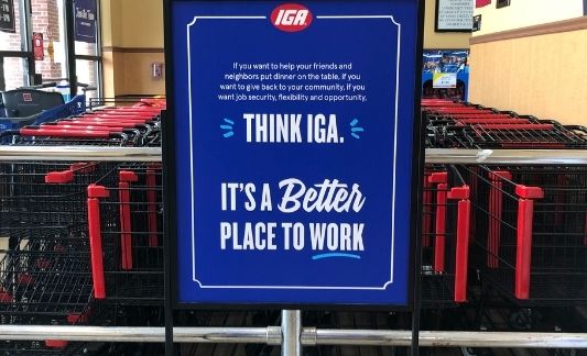 Think IGA. It's a Better Place to Work. (stanchion sign)