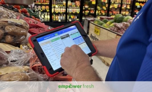Empower Fresh platform on tablet in produce department